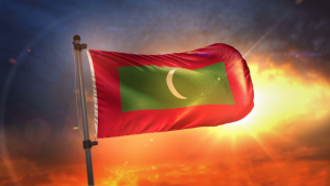 videoblocks-maldives-flag-backlit-at-beautiful-sunrise-loop-slow-motion-4k_suzw0qh-z_thumbnail-full01